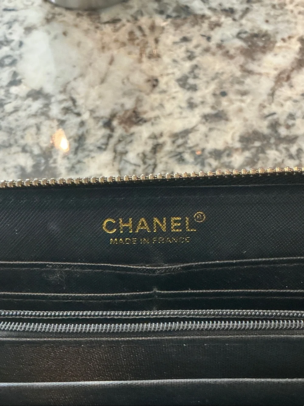 CHANEL Black Quilted Zip-Around Wallet with Gold CC Hardware